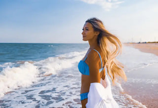 A woman who takes GLP-1 drugs for weight loss in non-diabetics on the beach near Jacksonville, FL 